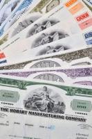 Amerikai Egyesült Államok 1962-1976. 10db klf részvény perforációval, bélyegzésekkel, lyukasztással érvénytelenítve T:I-III USA 1962-1976. 10pcs of diff shares, with perforations, stamps, cancelled by holes C:UNC-F