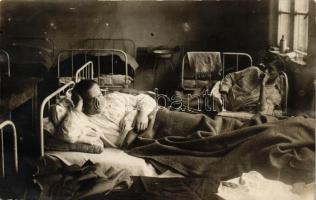 WWI Hungarian military hospital, interior, lying injured soldiers in beds, photo