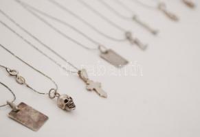 Ezüst(Ag) nyakláncok apró ezüst(Ag) medálokkal, jelzett, 8 db, br: 16,6 g