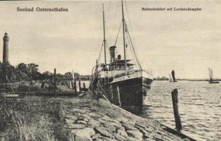 Swinoujscie, Ostseebad Osternothafen; Hafeineinfahrt mit Lootsendampfer 'Delphin' / port with steamship