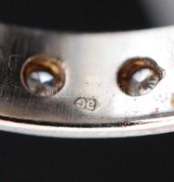 Női ezüst(Ag) gyűrű apró kövekkel, jelzett, méret: 53,  br: 3,8 g