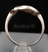 Női ezüst(Ag) gyűrű apró kövekkel, jelzett, méret: 54,  br: 3,6 g