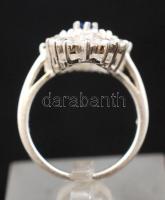 Női ezüst(Ag) gyűrű apró kövekkel díszítve, jelzett, méret: 54,  nettó: 5,4 g