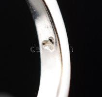 Női ezüst(Ag) gyűrű apró kövekkel díszítve, jelzett, méret: 54,  nettó: 5,4 g