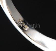 Női ezüst(Ag) gyűrű apró kövekkel díszítve, jelzett, méret: 54,  nettó: 5,4 g