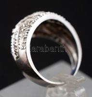 Női ezüst(Ag) gyűrű apró kövekkel díszítve, jelzett, méret: 54,  nettó: 5,6 g