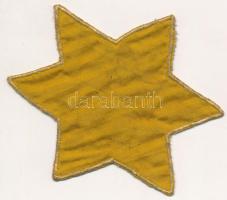 cca 1944 Ruhára varrható, szövet sárga csillag, hátoldalán szláv 'zsidó' felirattal, talán Kárpátaljáról / cca 1944 Fabric yellow star for Jews with Slavic word 'jew' on the back. Maybe from Subcarpathia