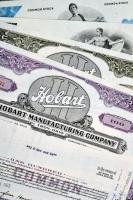 Amerikai Egyesült Államok 1962-1980. 10db klf részvény perforációval, bélyegzésekkel, lyukasztással érvénytelenítve T:I-III  USA 1962-1980. 10pcs of diff shares, with perforations, stamps, cancelled by holes C:UNC-F