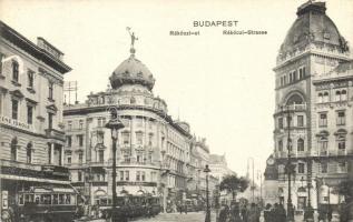 Budapest VII. Rákóczi út, Bonyhárd M. fogorvos, gyógyszertár, Suchard csokoládé üzlet, Pesti Hazai Első Takarékpénztár, villamosok (vágott / cut)