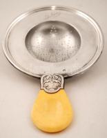 Ezüst (Ag.) teaszűrő "Jolán" felirattal, csont nyéllel, jelzett, br. 75 g