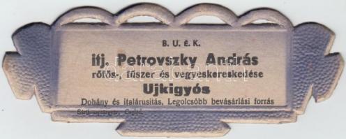 cca 1930 Petrovszky András rőfös- fűszer- és vegyeskereskedése, Újkígyós, kisméretű karton reklámtábla, újévi üdvözlettel, 6×15,5 cm