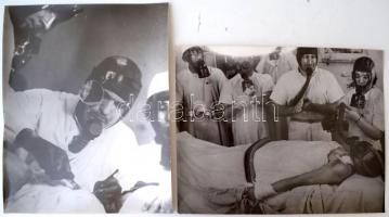 2 db műtéti beavatkozás közben készült fotó nagyítása, hátoldalon feliratozva, 24x30 cm