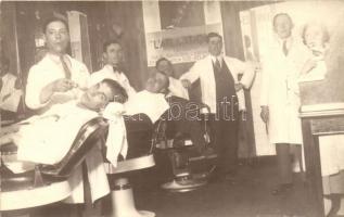 1931 Montevideo, LAtlantique barber shop, interior, barbers in work, Foto-Luz photo