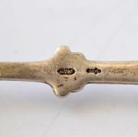 4 db ezüsttárgy: 3 db emlékkanál, 1 db gyűrű, jelzettek, bruttó 35,5 g