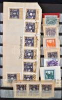 Több, mint 100 db vegyes okmánybélyeg, főleg kivágásokon 6 lapos közepes berakóban