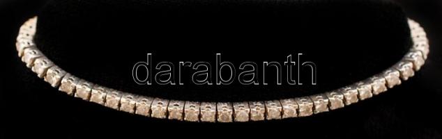 Fehér arany (14K) karkötő, 60 db modern csiszolású brill kővel (cca 1,8 CT M-M2-Tcr-Ca, Si P2), sorb...