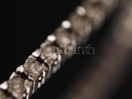 Fehér arany (14K) karkötő, 60 db modern csiszolású brill kővel (cca 1,8 CT M-M2-Tcr-Ca, Si P2), sorb...