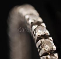 Fehér arany (14K) karkötő, 60 db modern csiszolású brill kővel (cca 1,8 CT M-M2-Tcr-Ca, Si P2), sorb...