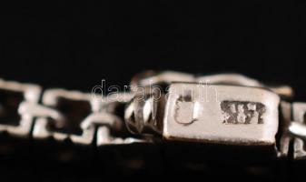 Fehér arany (14K) karkötő, 60 db modern csiszolású brill kővel (cca 1,8 CT M-M2-Tcr-Ca, Si P2), sorb...