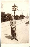 Budapest (?), 33-as körzeti villamos megállóhely, férfi öltönyben, photo