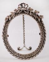 Ezüst támasztólábas ovális képkeret,  Ag., nettó:129,3gr., jelzett, 13x10cm/Silver  oval picture frame, Ag, net. 129,3gr, marked, 13x10cm