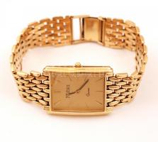 Nubia márkájú 14  K arany karóra. 14 K arany szíjjal, jelkett. Az óra quartz szerkezetű, üvegen sérü...