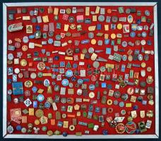 323db-os vegyes magyar és külföldi jelvény tétel a szocialista időszakból, jobb zománcozott darabokkal, rögzített textilre tűzve T:vegyes 323pcs of mixed socialist badges with better enamelled pieces C:mixed