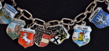 Díszes ezüst (Ag.)  karkötő, rajta zománcberakásos német városcímerekkel (az egyik fém), jelzett, h:...