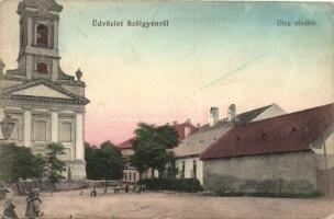 Szőgyén, Magyar-Szőgyén, Szölgyén, Svodni; utcarészlet a Katolikus templommal / street detail with the catholic church (EK)