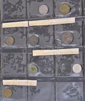 130db-os vegyes külföldi fémpénz gyűjtemény klf országokból sérült albumban, közte Tanzánia, Mongóli...