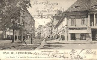 Nagyszeben, Hermannstadt, Sibiu; Heltauer utca, villamos, Julius Wermescher üzlete / Heltauergasse / street, tram