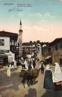 Sarajevo, Alifakovac ulica / street with minaret and shops, people in traditional dress, Bosnian folklore (EB)