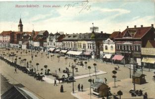 Marosvásárhely, Targu Mures; Főtéri részlet, Fekete Mihály 'Angyal' drogériája, Vámos Sándor üzlete, Ascher I. pavilonja, kiadja Porjes S. Sándor / main square, drug store, shop, vendor pavilion