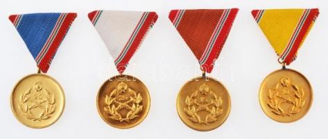 ~1960-1970. "Honvédelmi Érdemérem" aranyozott fém kitüntetések mellszalagon, tokban (4x), ...