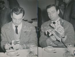 1957 Yves Montand (1921-1991) francia előadóművész  Budapestre érkezése és magyar nyelven kiadott könyvének dedikálása közben, Kotnyek Antal (1921-1990) fotóriporter 4 db jelzés nélküli vintage fotója, 18x12 cm