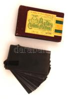 cca 1910 Jómódú, nagypolgári család privát fénykép felvételei (karácsony, lakásbelső, ruházat, gyerekek, stb.) 19 db üveglemez negatív és 1 db üveglemez pozitív kép eredeti dobozában, 14x8 cm