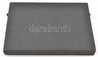 Érmetartó kazetta kivehető tálcával, 24 férőhellyel, használt, kis benyomódásokkal a peremén