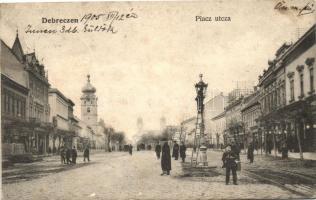 Debrecen, Piac utca, Wallerstein üzlete, utcai lámpa szerelése, kiadja Mihály Sámuel (EK)