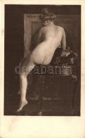 Nude lady on the table, erotic postcard