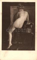 Nude lady on the table, erotic postcard