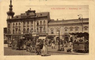 Kolozsvár, Széchenyi tér, Batiz János mozgóárus standja, piac. Kiadja a Ludasi dohánytőzsde / busy market place, vendors, shops