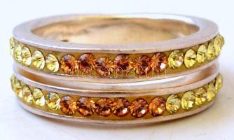 Ezüst(Ag) gyűrű kétsoros köves díszítéssel, jelzett, porcelán ékszertartóban, méret: 56, br: 7,3 g