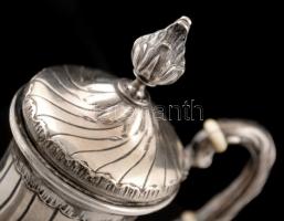 Ezüst (Ag.)  kávékiöntő, csavart, öblös test, trébelt, fülön csont gyűrű díszitéssel,nettó: 480gr., ...