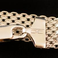 Ezüst(Ag) széles fonott karkötő, jelzett, h: 18,5 cm, nettó: 10,3 g