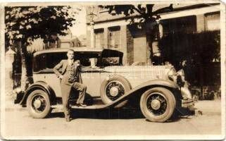 1936 Vintage automobile with driver Arthur P. Cook in London, "Car in flames" article about burnt down salon car with Arthur P. Cooke in it, glued on the backside, photo (fa)