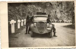 Vintage automobile with two men, photo