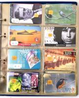 110 különféle magyar telefonkártya berakóba rendezve + Telefonkártya katalógus 1997