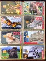 115 db különféle magyar telefonkártya berakóba rendezve + Telefonkártya katalógus 1991-1998