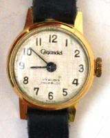 cca 1960 Arany (Au) 18K Gigandet Incabloc svájci mechanikus karóra, 17 köves, jelzett, bőr szíjjal, nem működik, bruttó: 7,7 gr./ Golden (Au) 18 K Gigandet Incabloc swiss mechanical watch, 17 jewells, with hallmark, with leather wristband, not working, brutto: 7.7 gr.