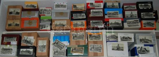 Hatalmas sokpéldányos képeslap tétel : kb. 36.000 dán városképes lap, 1940 körüli kiadás, 28 féle, T1 minőségű használatlan lapok gyári kötegekben. Viszonteladónak hosszútávú de jó befektetés!! / Large stock of Danish topographic cards: 36.000 cards, 28 different, of excellent quality issued about 1940, in original bundles. A good long term investment for the retailer!!